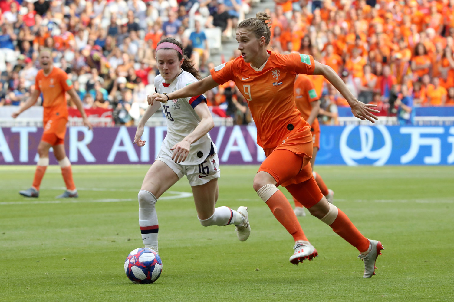 Rose Lavelle (left) of the United States, a graduate of Mount Notre Dame High School in Reading, Ohio, and Vivianne Miedema of the Netherlands battle for the ball during the FIFA Women’s World Cup in Lyon, France, July 7, 2019. The U.S. won its record fourth Women’s World Cup title and second in a row, beating the Netherlands 2-0.
